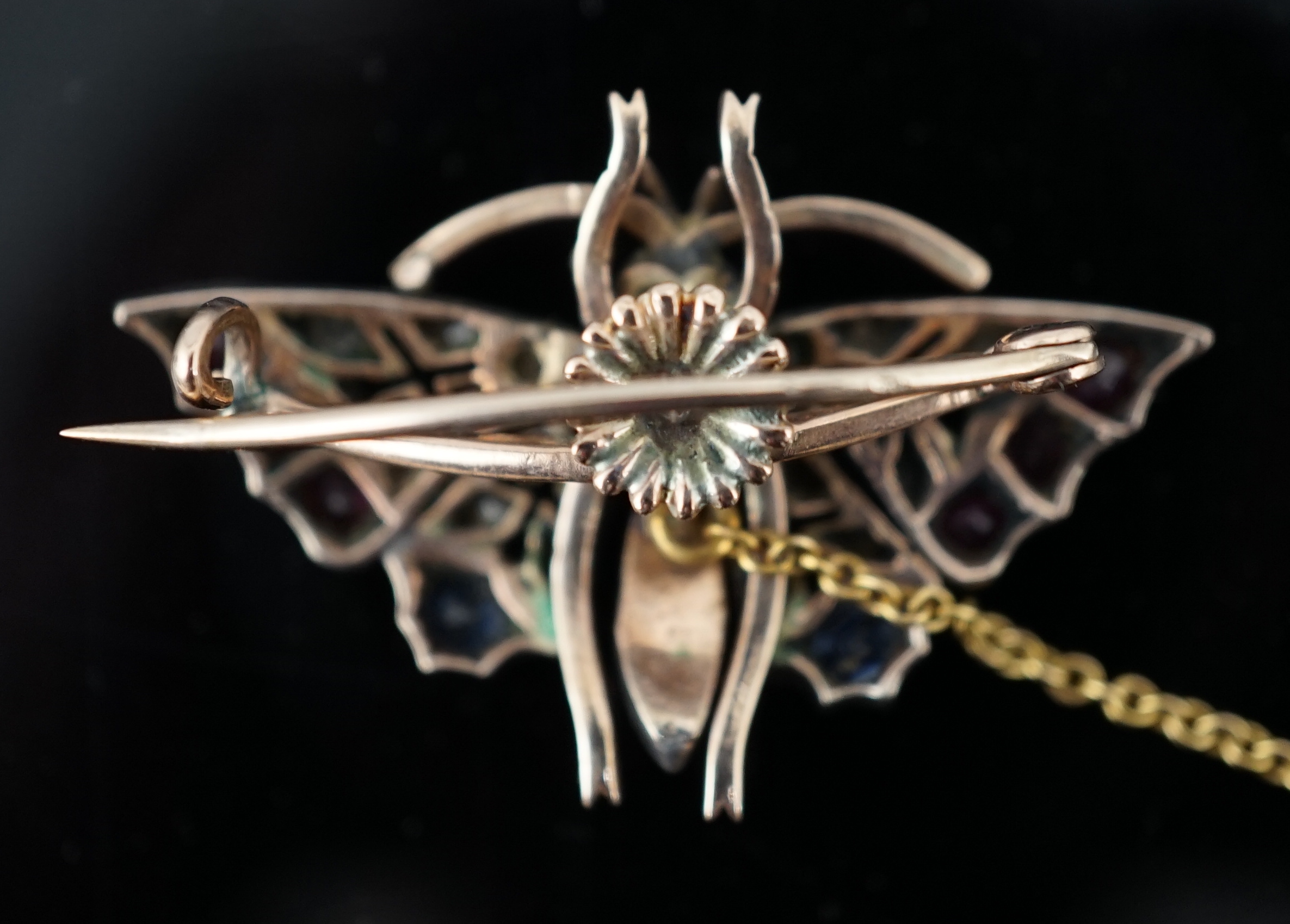 A Victorian gold, ruby, sapphire, split pearl and diamond cluster set butterfly brooch